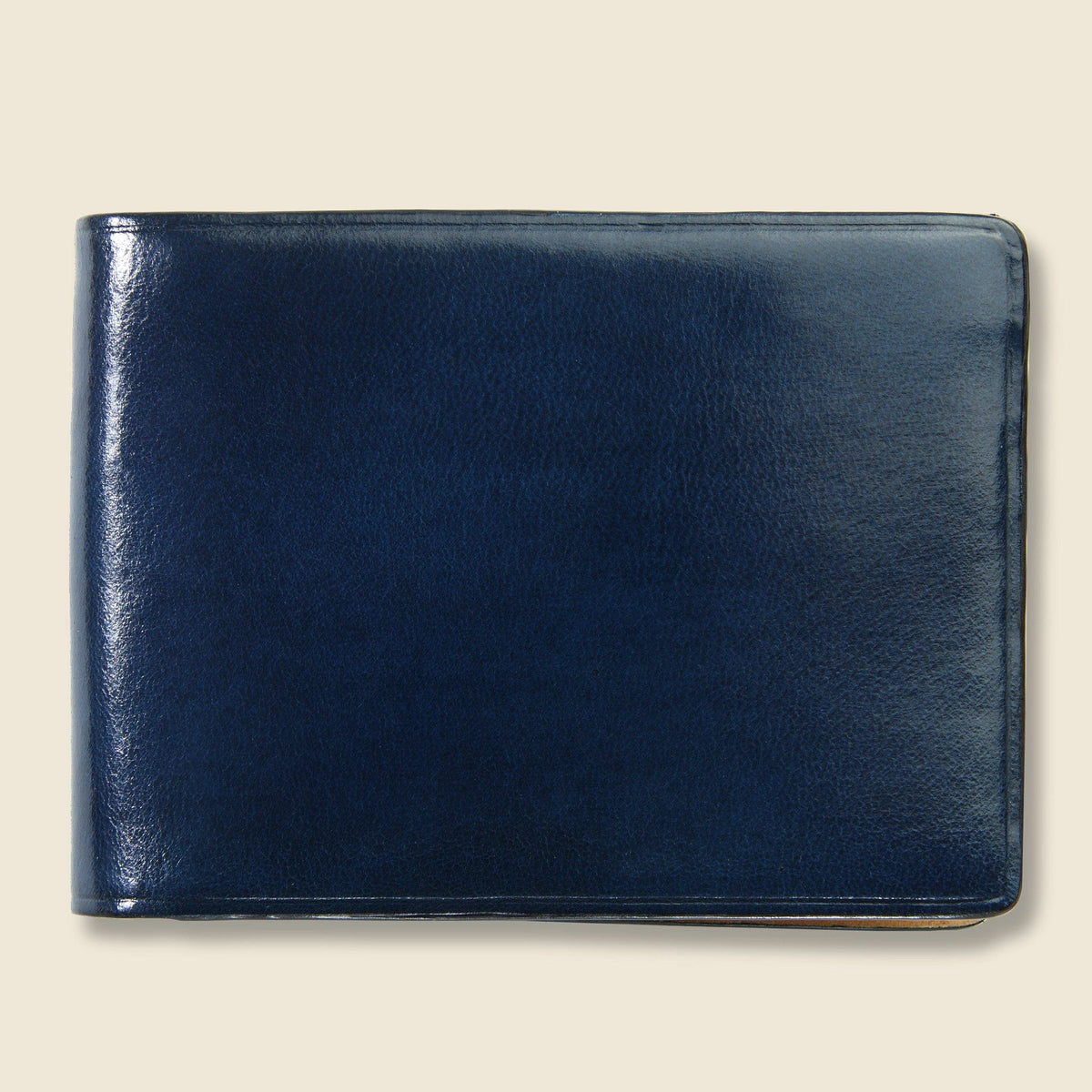 Il Bussetto Small Bi-Fold Wallet in Navy handcrafted from premium vegetable-tanned leather with a slim minimalist design.