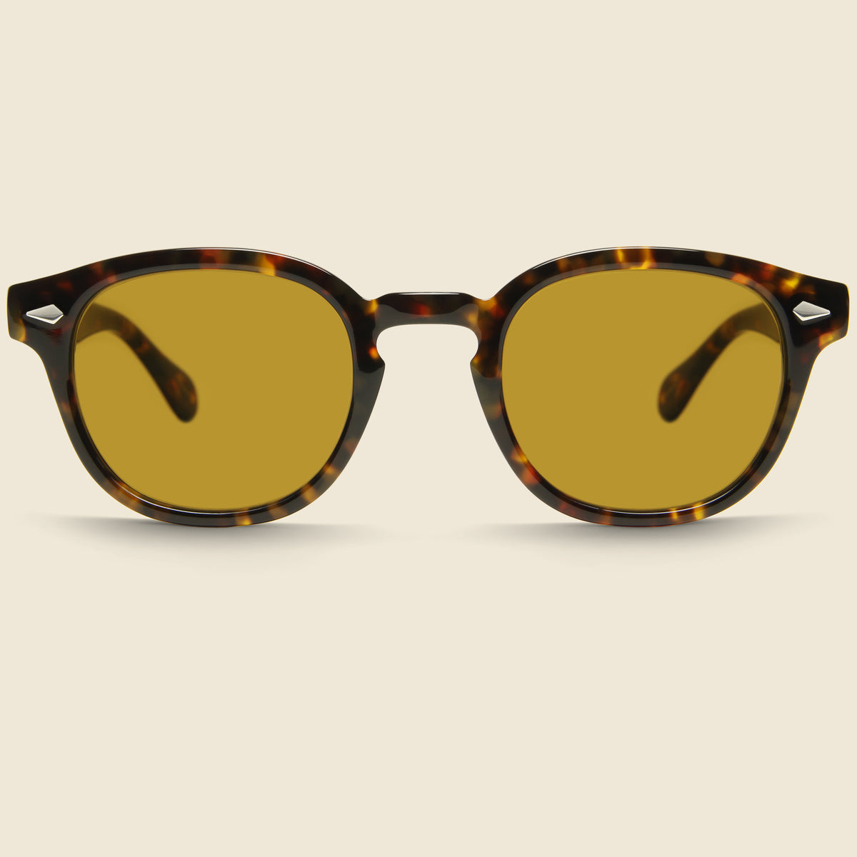 Moscot Lemtosh Eyeglasses in Core Tortoise and Cosmitan Brown featuring an iconic rounded frame and vintage-inspired design.